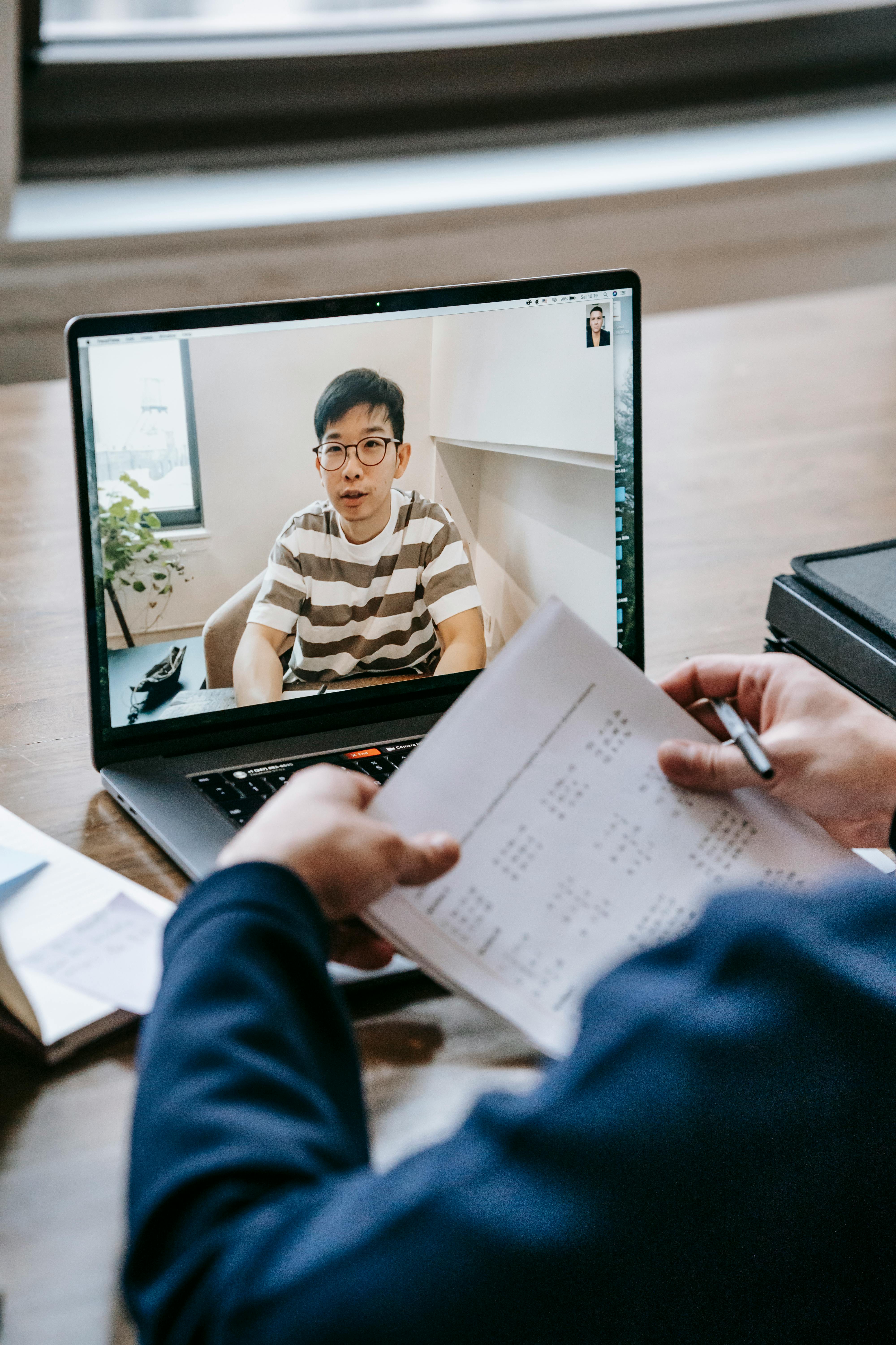 Child using laptop for video chat